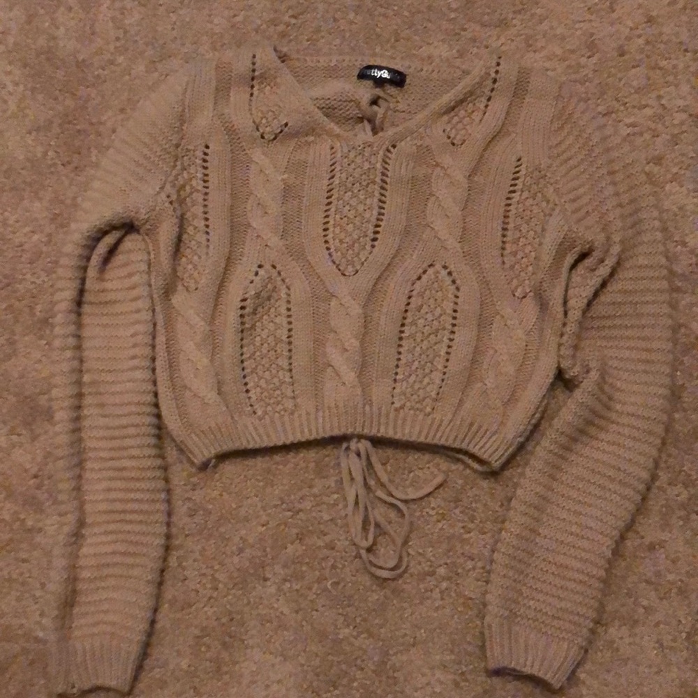 Cropped, tan sweater. Lace up back.